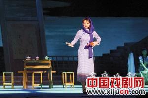 新京剧《江竹筠》明天上映。
